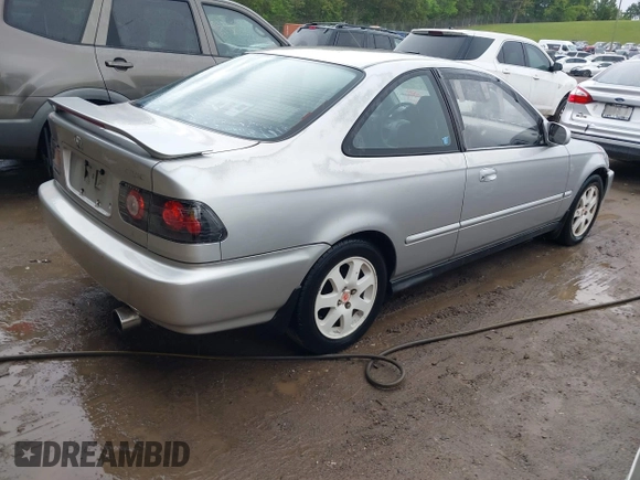 1997 Honda Civic EX z VIN 1HGEJ8144VL050538, wystawiony jako IAAI lot #42118882 z przebiegiem 384 347 mil mil oraz . Historia ofert i sprzedaży dostępna na DreamBid. Obrazek 4.