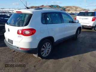 2011 Volkswagen Tiguan SE with VIN WVGBV7AX8BW536365, listed as a IAAI auction lot 41854029 with 126,916 mi miles and . Bid and sale history available at DreamBid. Image 4.