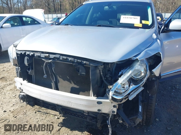 2013 Infiniti JX35 with VIN 5N1AL0MM3DC336945, listed as a IAAI auction lot 41858705 with 114,784 mi miles. Bid and sale history available at carsss.com. Image 6.