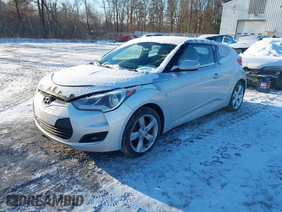 2012 Hyundai Veloster w/Gray Int with VIN KMHTC6AD0CU034568, listed as a IAAI auction lot 41460659 with 141,826 mi miles and . Bid and sale history available at DreamBid. Image 2.
