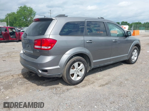 2012 Dodge Journey SXT with VIN 3C4PDCBB0CT358287, listed as a IAAI auction lot 42134914 with 140,553 mi miles and . Bid and sale history available at DreamBid. Image 4.