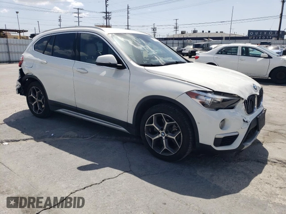 2018 BMW X1 xDrive28i with VIN WBXHT3C35J5L26952, listed as a Copart auction lot 51715035 with 63,306 mi miles and Salvage Title. Bid and sale history available at carsss.com. Image 4.