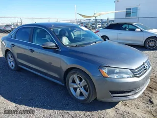 2012 Volkswagen Passat SE with VIN 1VWBP7A31CC008775, listed as a IAAI auction lot 41353437 with 118,815 mi miles. Bid and sale history available at carsss.com. Image 1.