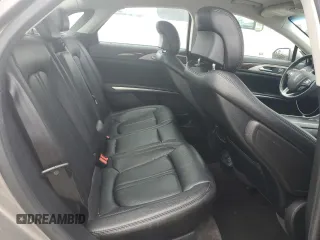 2015 Lincoln MKZ Hybrid z VIN 3LN6L2LU4FR625940, wystawiony jako Copart lot #61721025 z przebiegiem 56 151 mil mil oraz Szkoda całkowita • Salvage title. Historia ofert i sprzedaży dostępna na DreamBid. Obrazek 10.