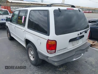 1998 Ford Explorer XL z VIN 1FMZU32E6WZB42875, wystawiony jako IAAI lot #41904223 z przebiegiem 265 981 mil mil oraz . Historia ofert i sprzedaży dostępna na DreamBid. Obrazek 3.