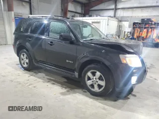 2011 Mercury Mariner Hybrid with VIN 4M2CN3K3XBKJ04133, listed as a Copart auction lot 76483784 with 428,010 mi miles and Clean Title. Bid and sale history available at carsss.com. Image 4.