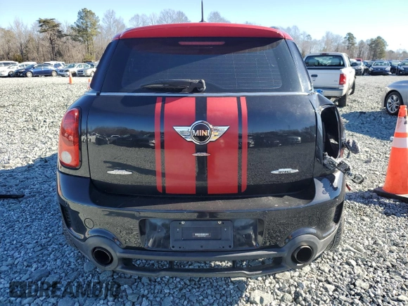 2014 MINI Countryman John Cooper Works with VIN WMWXD1C5XEWS34681, listed as a Copart auction lot 41781005 with 133,463 mi miles and Salvage Title. Bid and sale history available at DreamBid. Image 6.