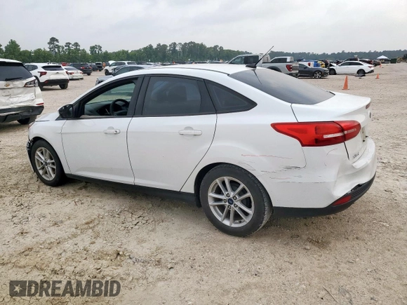 2018 Ford Focus SE with VIN 1FADP3F23JL246375, listed as a Copart auction lot 56539005 with 83,130 mi miles and Salvage title. Bid and sale history available at DreamBid. Image 2.