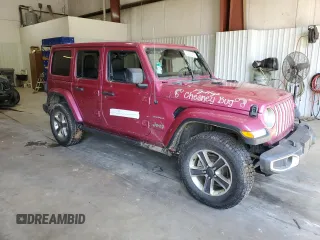 2022 Jeep Wrangler Unlimited Sahara with VIN 1C4HJXEN0NW106045, listed as a Copart auction lot 52383455 with 104,937 mi miles and Salvage title. Bid and sale history available at DreamBid. Image 4.