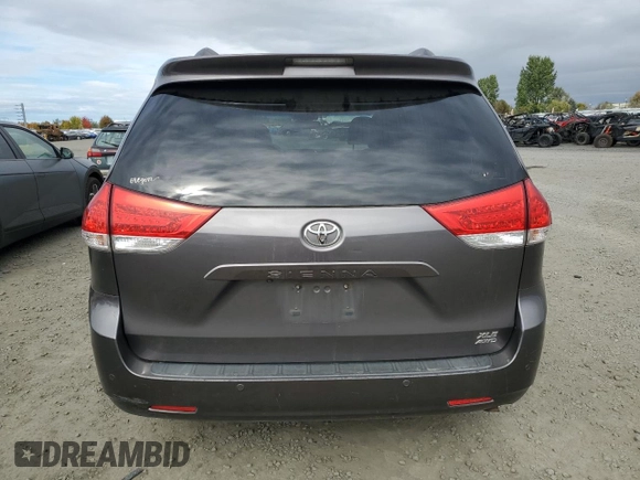 2011 Toyota Sienna XLE z VIN 5TDDK3DC8BS013239, wystawiony jako Copart lot #74852364 z przebiegiem 212 060 mil mil oraz Szkoda całkowita • Salvage title. Historia ofert i sprzedaży dostępna na DreamBid. Obrazek 6.