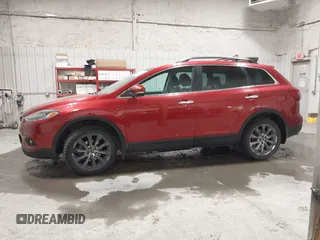 2015 Mazda CX-9 Grand Touring z VIN JM3TB3DAXF0464215, wystawiony jako IAAI lot #42043092 z przebiegiem 119 269 mil mil oraz . Historia ofert i sprzedaży dostępna na DreamBid. Obrazek 14.