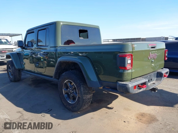 2022 Jeep Gladiator Rubicon z VIN 1C6JJTBG1NL163699, wystawiony jako IAAI lot #41014300 z przebiegiem Nie podano mil oraz . Historia ofert i sprzedaży dostępna na DreamBid. Obrazek 3.