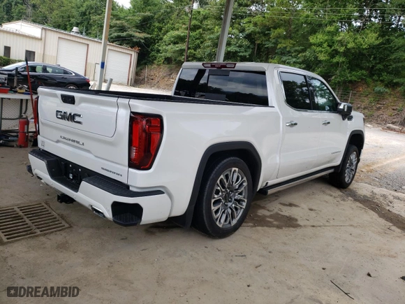 2023 GMC Sierra 1500 Denali Ultimate with VIN 1GTUUHEL0PZ318889, listed as a Copart auction lot 71713984 with 8,986 mi miles and Salvage Title. Bid and sale history available at carsss.com. Image 3.