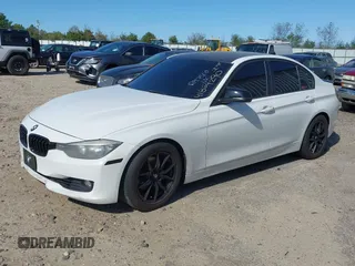 2013 BMW 3 Series 328i with VIN WBA3C1G59DNR47510, listed as a IAAI auction lot 41864290 with 160,585 mi miles. Bid and sale history available at carsss.com. Image 2.