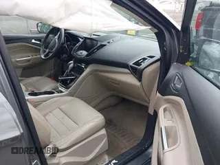 2013 Ford Escape SEL z VIN 1FMCU9H96DUC66206, wystawiony jako IAAI lot #42376442 z przebiegiem 96 776 mil mil oraz . Historia ofert i sprzedaży dostępna na DreamBid. Obrazek 5.