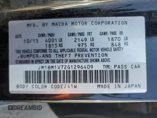 2016 Mazda 3 i Touring with VIN JM1BM1V72G1296409, listed as a Copart auction lot 59008785 with 124,738 mi miles and Salvage title. Bid and sale history available at DreamBid. Image 12.