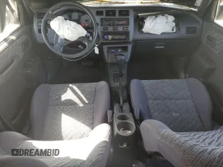 1999 Toyota RAV4 with VIN JT3GP10V5X7053634, listed as a Copart auction lot 52761695 with 236,443 mi miles and Salvage title. Bid and sale history available at DreamBid. Image 8.