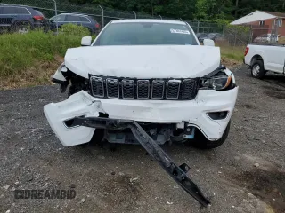 2018 Jeep Grand Cherokee Laredo E with VIN 1C4RJEAGXJC430096, listed as a Copart auction lot 57391405 with 89,248 mi miles and Salvage title. Bid and sale history available at DreamBid. Image 5.