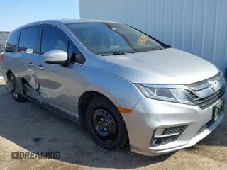 2019 Honda Odyssey EX-L with VIN 5FNRL6H79KB043145, listed as a IAAI auction lot 41569198 with 94,560 mi miles. Bid and sale history available at carsss.com. Image 1.