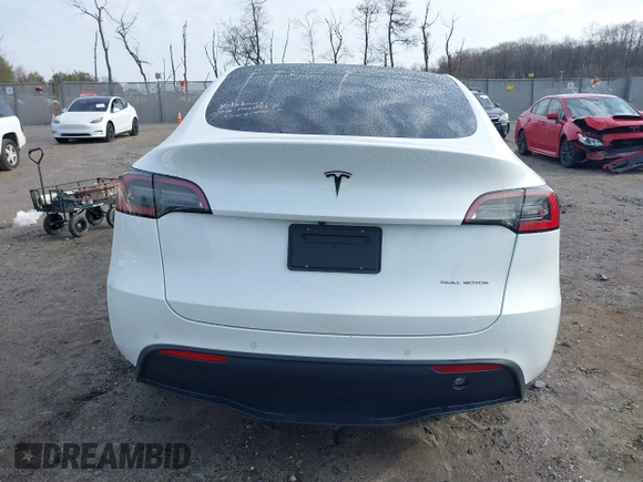 2022 Tesla Model Y Long Range z VIN 7SAYGDEE0NF435252, wystawiony jako IAAI lot #41449612 z przebiegiem 48 671 mil mil oraz . Historia ofert i sprzedaży dostępna na DreamBid. Obrazek 16.