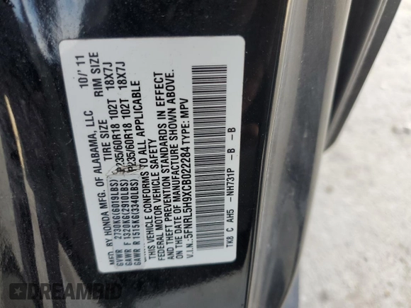 2012 Honda Odyssey Touring with VIN 5FNRL5H9XCB022284, listed as a Copart auction lot 82766824 with Not provided miles and Salvage title. Bid and sale history available at DreamBid. Image 13.