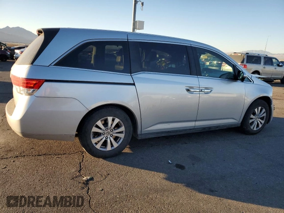 2015 Honda Odyssey EX-L with VIN 5FNRL5H69FB077433, listed as a Copart auction lot 88999285 with 193,926 mi miles and Salvage Title. Bid and sale history available at DreamBid. Image 3.