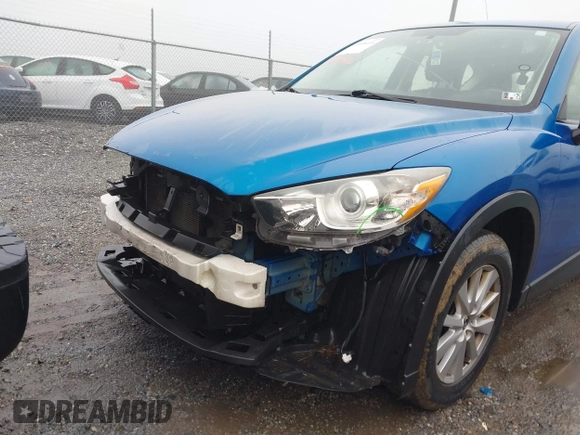 2013 Mazda CX-5 Sport with VIN JM3KE4BE9D0157890, listed as a IAAI auction lot 40998406 with 134,087 mi miles. Bid and sale history available at carsss.com. Image 6.
