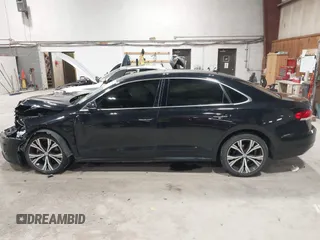 2021 Volkswagen Passat SE z VIN 1VWSA7A39MC001401, wystawiony jako IAAI lot #42019308 z przebiegiem 82 203 mil mil oraz . Historia ofert i sprzedaży dostępna na DreamBid. Obrazek 14.