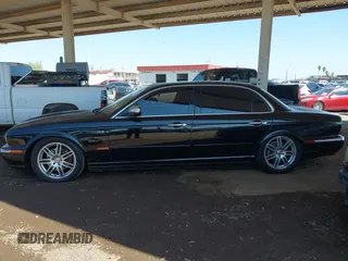 2005 Jaguar XJ Vanden Plas z VIN SAJWA82C05SG47589, wystawiony jako IAAI lot #42409697 z przebiegiem 222 598 mil mil oraz . Historia ofert i sprzedaży dostępna na DreamBid. Obrazek 14.
