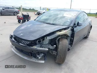 2023 Tesla Model 3 with VIN 5YJ3E1EA7PF417293, listed as a IAAI auction lot 42407659 with 22,578 mi miles and . Bid and sale history available at DreamBid. Image 6.