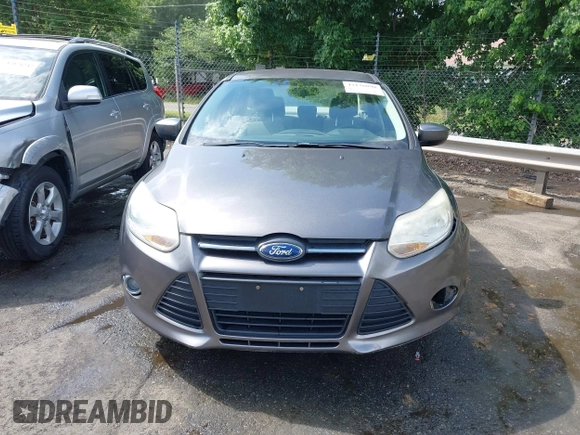 2012 Ford Focus SE z VIN 1FAHP3F22CL125941, wystawiony jako IAAI lot #42176898 z przebiegiem 157 940 mil mil oraz . Historia ofert i sprzedaży dostępna na DreamBid. Obrazek 12.