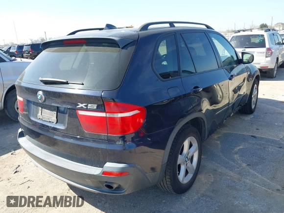 2008 BMW X5 3.0si with VIN 5UXFE43588L025702, listed as a IAAI auction lot 41705837 with 184,296 mi miles. Bid and sale history available at carsss.com. Image 4.