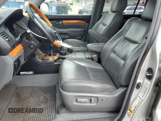 2005 Lexus GX 470 z VIN JTJBT20X050082258, wystawiony jako Copart lot #55812505 z przebiegiem 194 075 mil mil oraz Szkody całkowita. Historia ofert i sprzedaży dostępna na DreamBid. Obrazek 7.