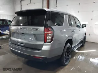 2023 Chevrolet Tahoe LT with VIN 1GNSKNKDXPR504598, listed as a IAAI auction lot 41383754 with 23,033 mi miles. Bid and sale history available at carsss.com. Image 4.