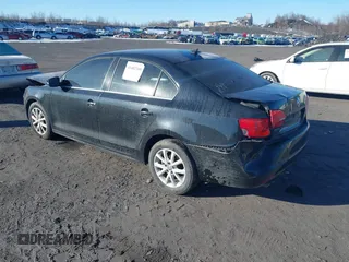 2013 Volkswagen Jetta Sedan SE w/Convenience/Sunroof with VIN 3VWBP7AJ1DM402355, listed as a IAAI auction lot 41402360 with 146,272 mi miles. Bid and sale history available at carsss.com. Image 3.
