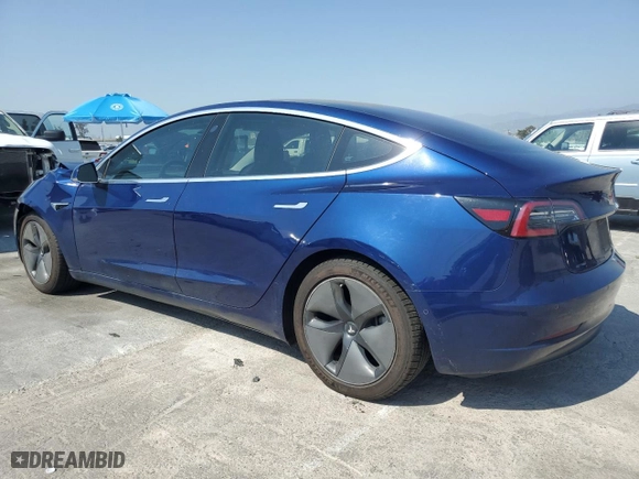 2018 Tesla Model 3 Long Range Battery with VIN 5YJ3E1EA8JF051660, listed as a Copart auction lot 52556255 with 126,105 mi miles and Clean Title. Bid and sale history available at carsss.com. Image 2.