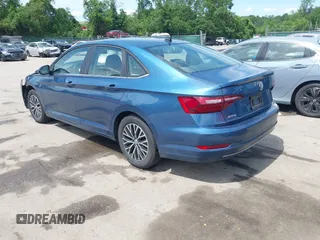 2021 Volkswagen Jetta S z VIN 3VWC57BU6MM046066, wystawiony jako IAAI lot #42199064 z przebiegiem 86 394 mil mil oraz . Historia ofert i sprzedaży dostępna na DreamBid. Obrazek 3.