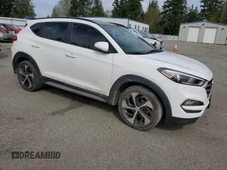 2017 Hyundai Tucson Sport with VIN KM8J3CA25HU570945, listed as a Copart auction lot 52555265 with 124,192 mi miles and Salvage Title. Bid and sale history available at DreamBid. Image 4.