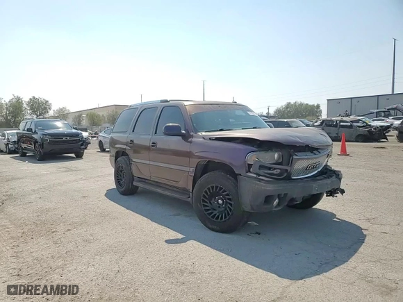 2002 GMC Yukon Denali with VIN 1GKEK63U62J340241, listed as a Copart auction lot 71122174 with 259,297 mi miles and Salvage Title. Bid and sale history available at carsss.com. Image 11.