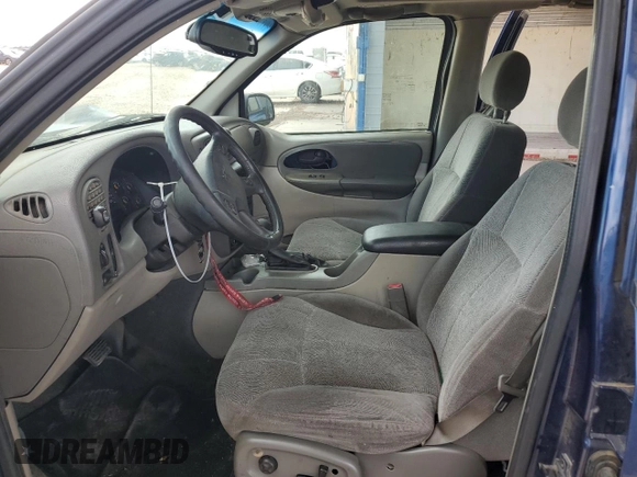 2003 Chevrolet TrailBlazer LT with VIN 1GNDS13SX32283585, listed as a Copart auction lot 65069794 with 194,832 mi miles and Salvage Title. Bid and sale history available at DreamBid. Image 7.
