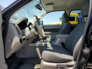 2009 Ford Escape Hybrid with VIN 1FMCU49399KB39692, listed as a Copart auction lot 64418925 with 147,204 mi miles and Salvage title. Bid and sale history available at DreamBid. Image 7.