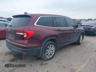 2019 Honda Pilot LX with VIN 5FNYF5H12KB023764, listed as a IAAI auction lot 41589629 with 66,879 mi miles. Bid and sale history available at carsss.com. Image 4.