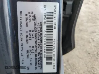 2014 Mazda 3 i Touring with VIN JM1BM1V73E1173070, listed as a Copart auction lot 50351915 with 11,952 mi miles and Salvage Title. Bid and sale history available at DreamBid. Image 12.