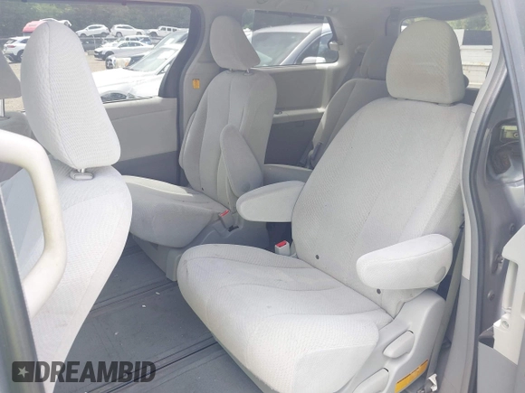 2013 Toyota Sienna LE with VIN 5TDJK3DC9DS054310, listed as a IAAI auction lot 42668103 with 209,712 mi miles and . Bid and sale history available at DreamBid. Image 8.