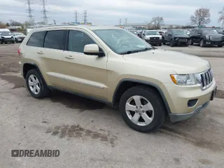 2011 Jeep Grand Cherokee Laredo z VIN 1J4RR4GG9BC737829, wystawiony jako IAAI lot #42080518 z przebiegiem 192 372 mil mil oraz . Historia ofert i sprzedaży dostępna na DreamBid. Obrazek 1.
