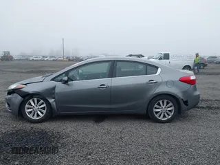 2014 Kia Forte EX with VIN KNAFX4A8XE5213014, listed as a IAAI auction lot 41000589 with 89,890 mi miles. Bid and sale history available at carsss.com. Image 14.