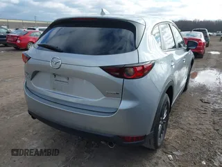 2020 Mazda CX-5 Touring with VIN JM3KFACM5L0768371, listed as a IAAI auction lot 41862623 with 138,446 mi miles and . Bid and sale history available at carsss.com. Image 4.