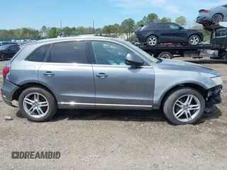 2014 Audi Q5 Premium Plus with VIN WA1LFAFP2EA060718, listed as a IAAI auction lot 42161099 with 122,914 mi miles and . Bid and sale history available at DreamBid. Image 14.