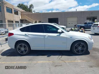 2015 BMW X4 xDrive28i with VIN 5UXXW3C5XF0M89147, listed as a IAAI auction lot 42779290 with 120,773 mi miles and . Bid and sale history available at DreamBid. Image 12.