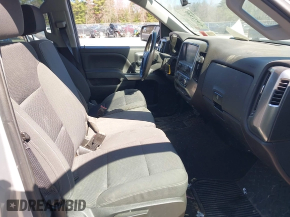 2018 Chevrolet Silverado 1500 LT with VIN 1GCVKREH4JZ323242, listed as a IAAI auction lot 41971945 with 63,915 mi miles and . Bid and sale history available at DreamBid. Image 5.